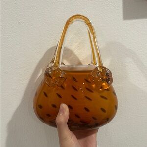 Unique, vintage-like, glass handbag vase

Approx size (LWH): 6x2x8 in.